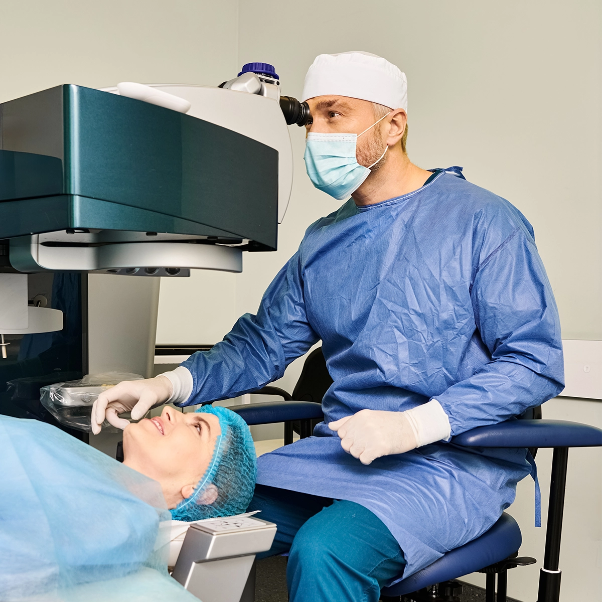 Eye surgeon preparing patient for IV free surgery at eye clinic in Central Florida