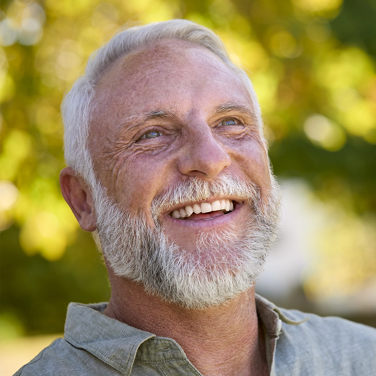 Senior male patient enjoying the benefits of clear vision thanks to advanced lens implants in Florida