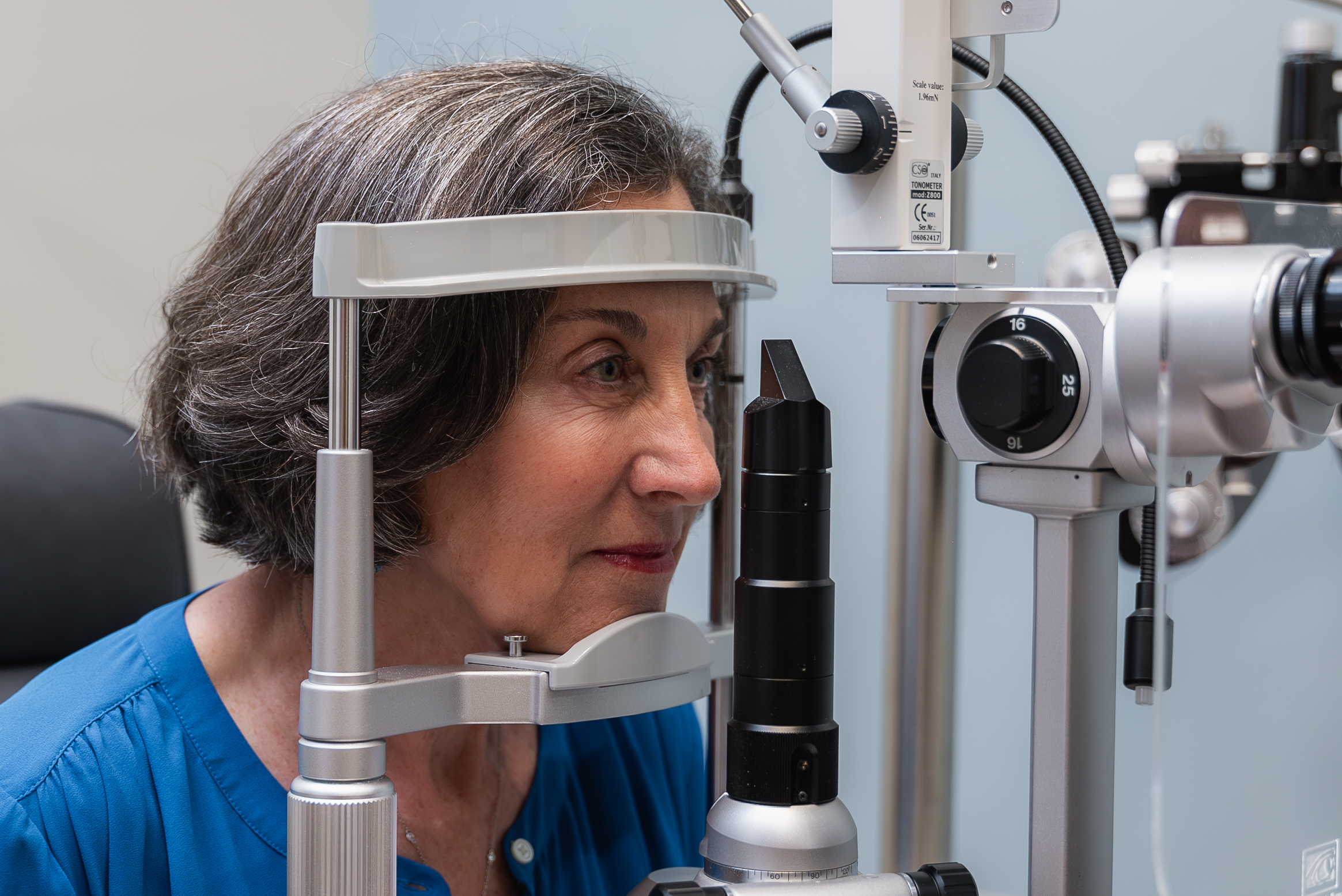 Woman getting eye exam